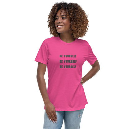 Smiling woman wearing a berry relaxed t-shirt with 'Be Yourself' text repeated