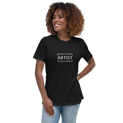 Woman wearing a black relaxed t-shirt labeled 'ARTIST'