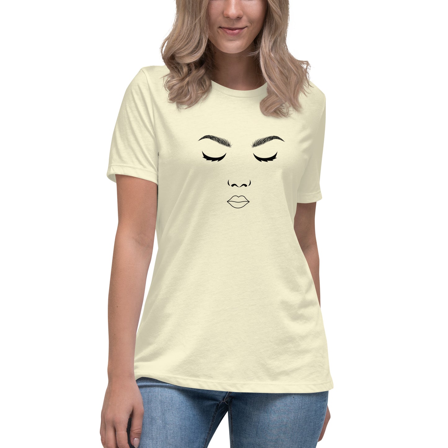 Woman wearing a citron relaxed t-shirt featuring a minimalist face design