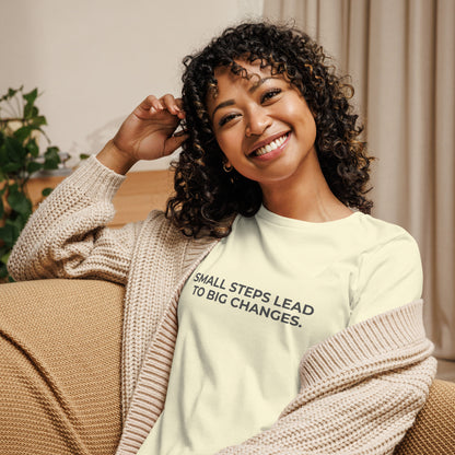 Woman wearing an citron relaxed tee with "Small Steps Lead to Big Changes" printed.