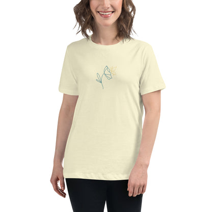 Woman wearing a citron relaxed tee with a minimalist flower graphic design, embodying comfortable and authentic fashion by BYOL.