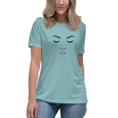 Woman wearing a heather blue relaxed t-shirt featuring a minimalist face design