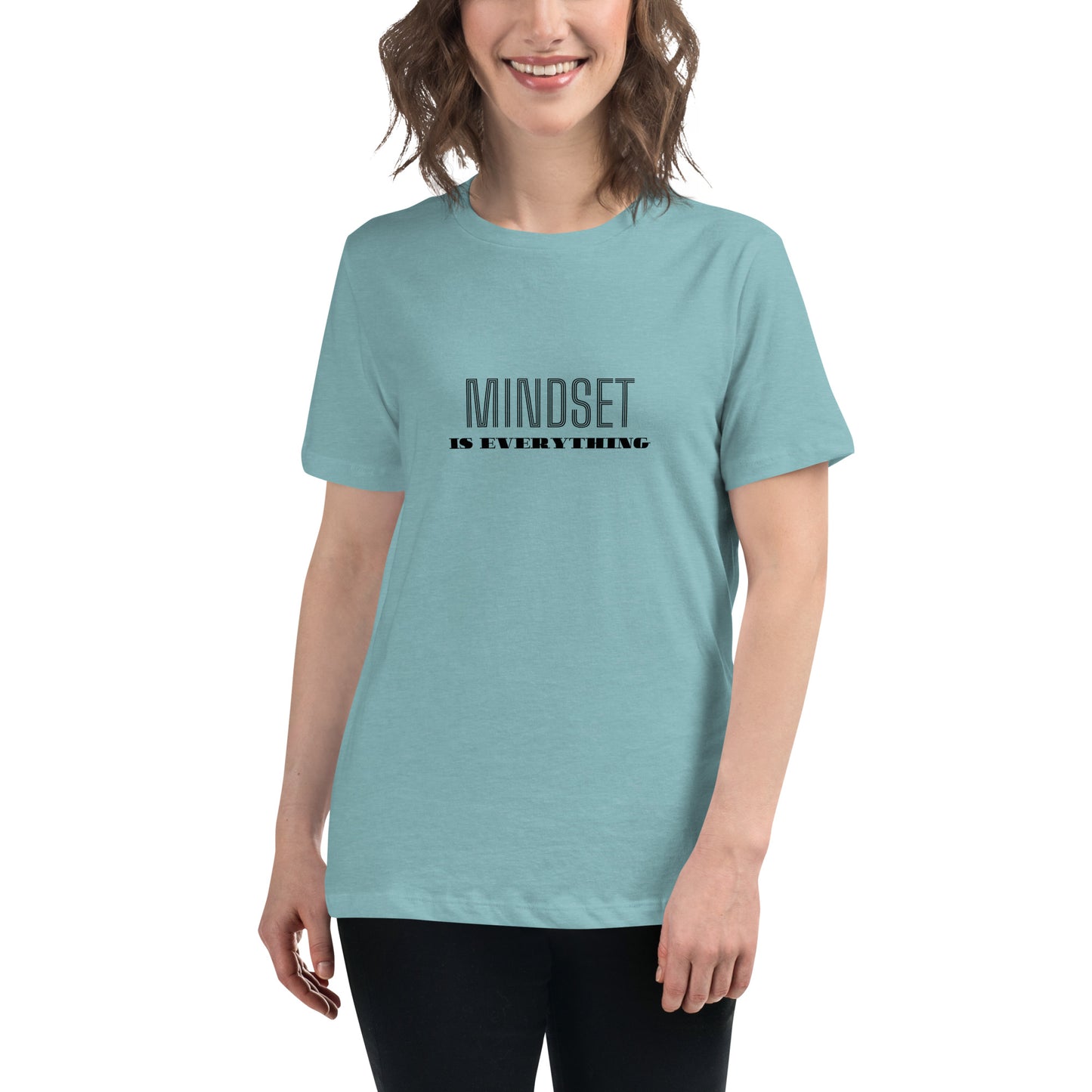 Woman wearing a heather blue relaxed t-shirt with the phrase "Mindset is Everything" printed in black.