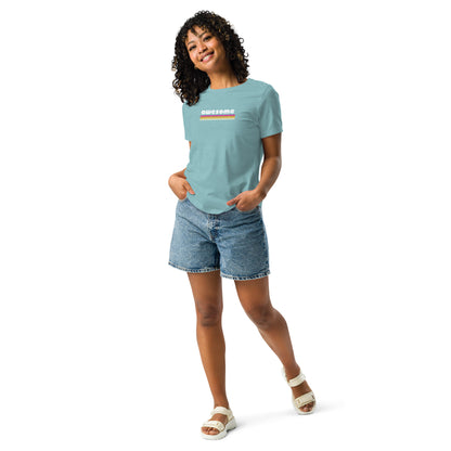 Smiling woman wearing a heather blue relaxed t-shirt with 'awesome' in retro style print