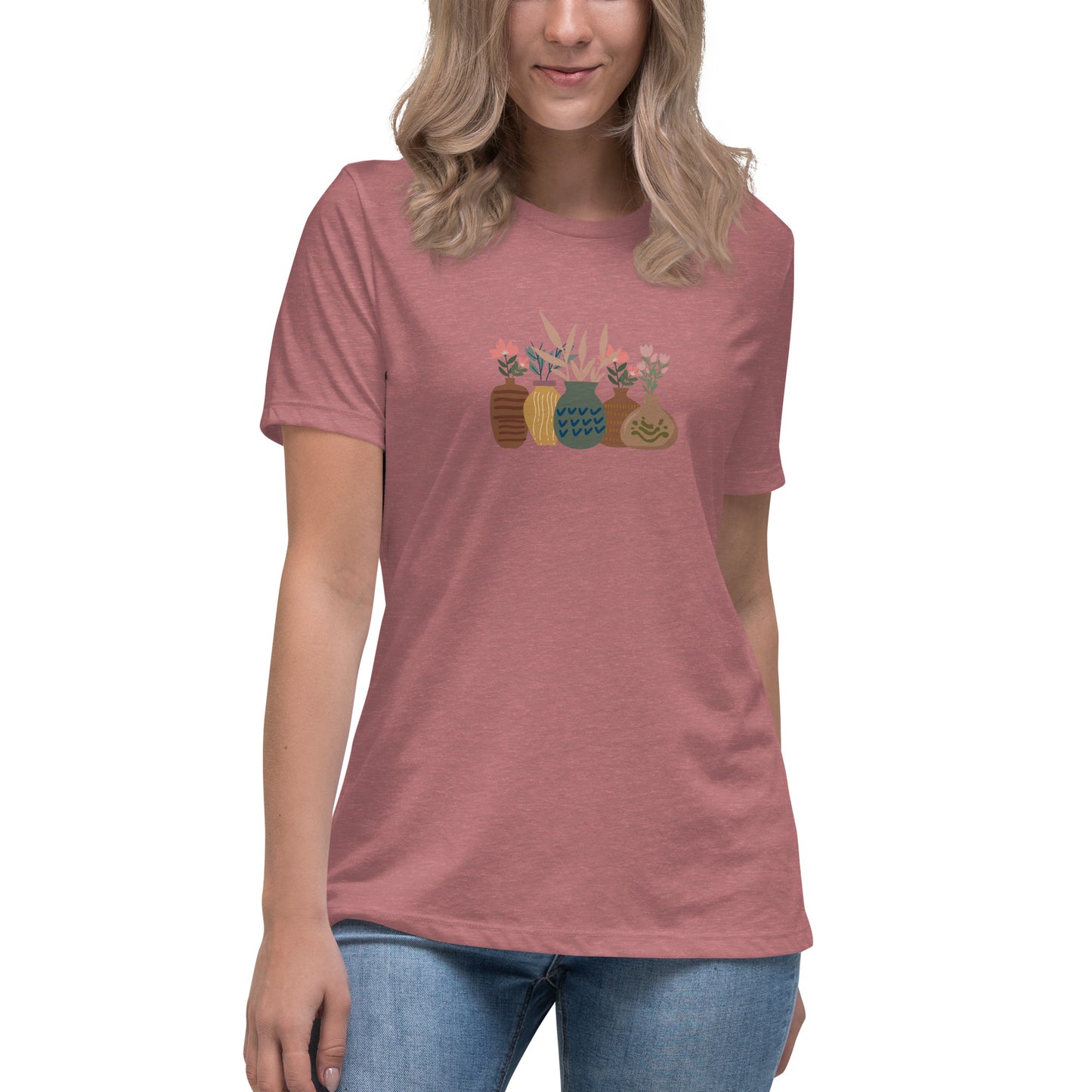 Woman wearing a heather mauve relaxed tee with a charming vase floral graphic design, embodying comfortable and authentic fashion by BYOL.