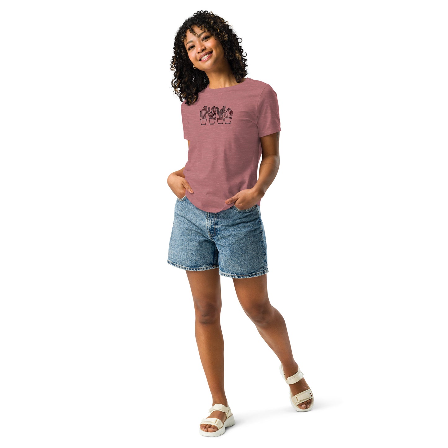 Woman wearing a heather mauve relaxed tee with a subtle cactus line art design, showcasing comfortable and authentic fashion by BYOL.