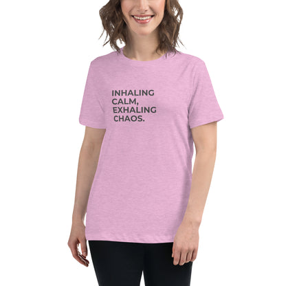 Woman wearing a heather prism lilac relaxed tee with "Inhaling Calm, Exhaling Chaos" printed.