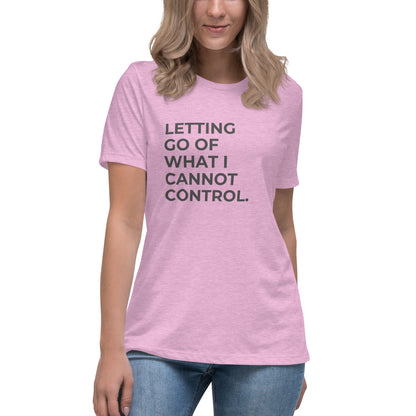 Woman wearing a heather prism lilac relaxed tee with "Letting Go of What I Cannot Control" printed.