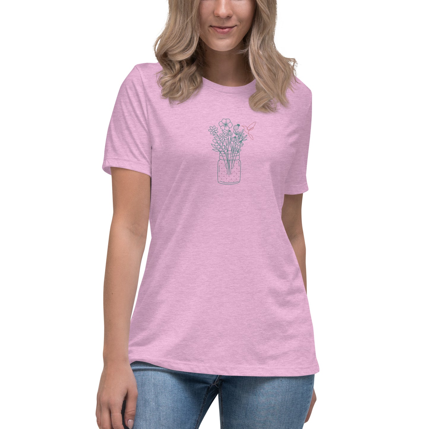 Woman wearing a heather prism lilac relaxed tee with a delicate floral jar graphic design, representing comfortable and authentic fashion by BYOL.