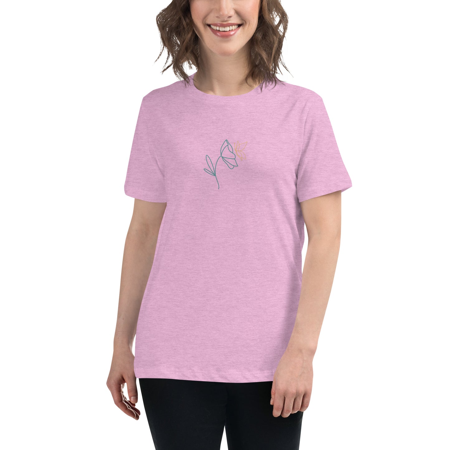 Woman wearing a heather prism lilac relaxed tee with a minimalist flower graphic design, embodying comfortable and authentic fashion by BYOL.