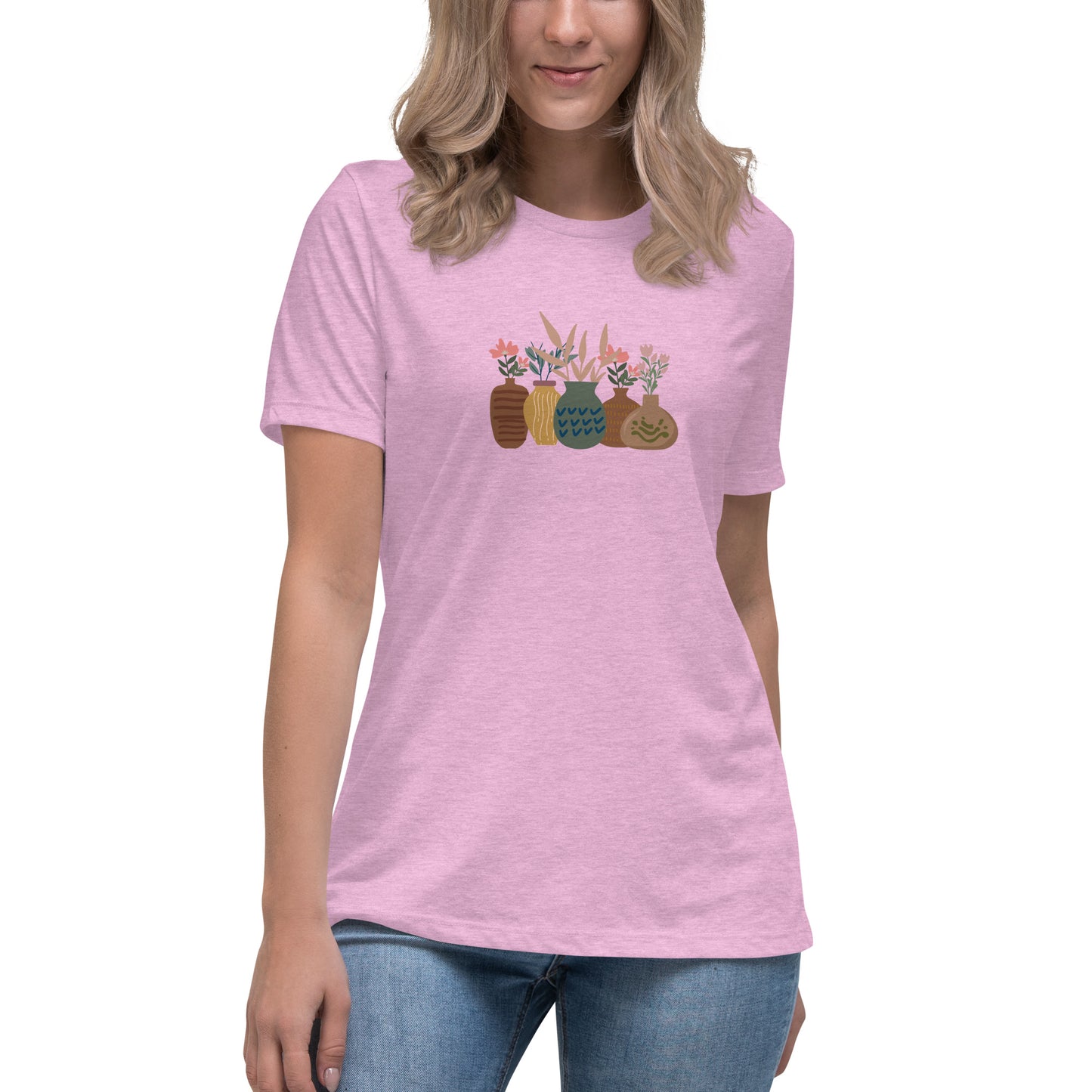 Woman wearing a heather prism lilac relaxed tee with a charming vase floral graphic design, embodying comfortable and authentic fashion by BYOL.