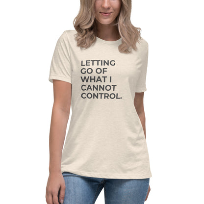 Woman wearing a citron relaxed tee with "Letting Go of What I Cannot Control" printed.