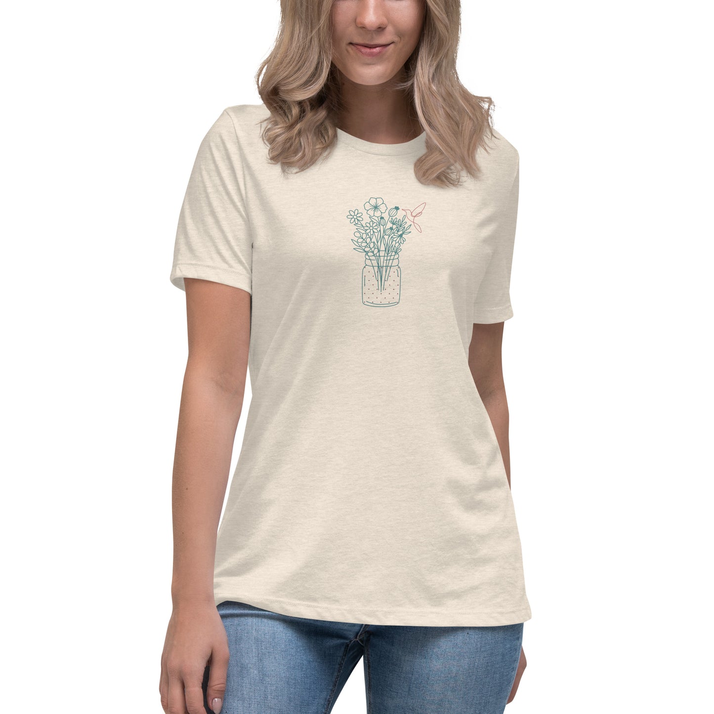 Woman wearing a heather prism natural relaxed tee with a delicate floral jar graphic design, representing comfortable and authentic fashion by BYOL.