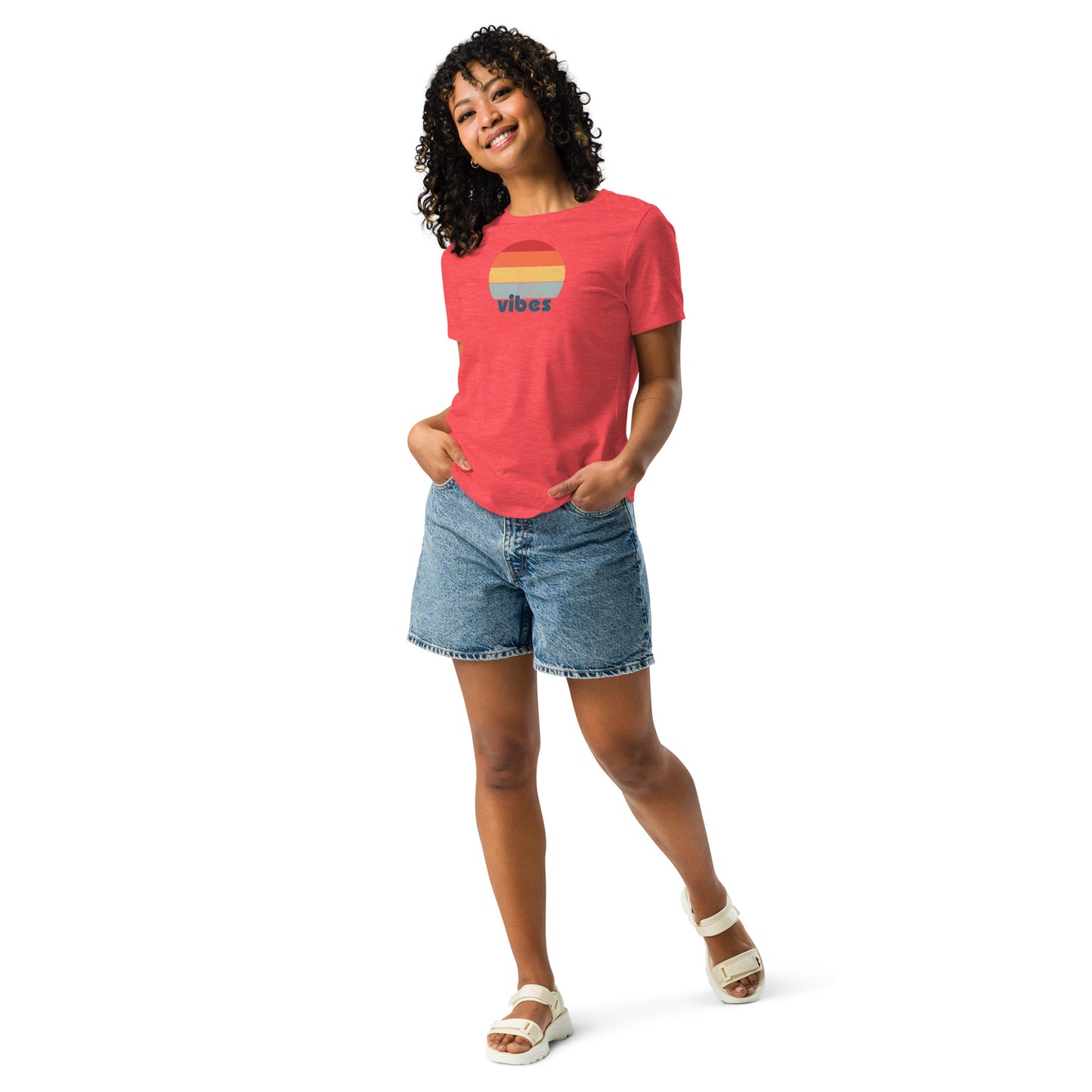 Woman wearing a heather red relaxed t-shirt with retro 'good vibes' graphic