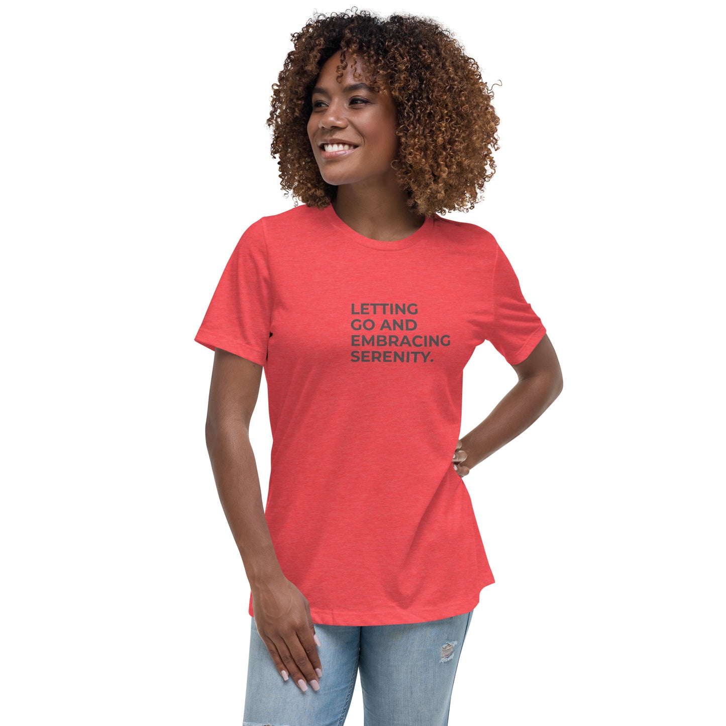 Woman wearing a heather red relaxed tee with "Letting Go and Embracing Serenity" printed, available in various colors and sizes from S-3XL.