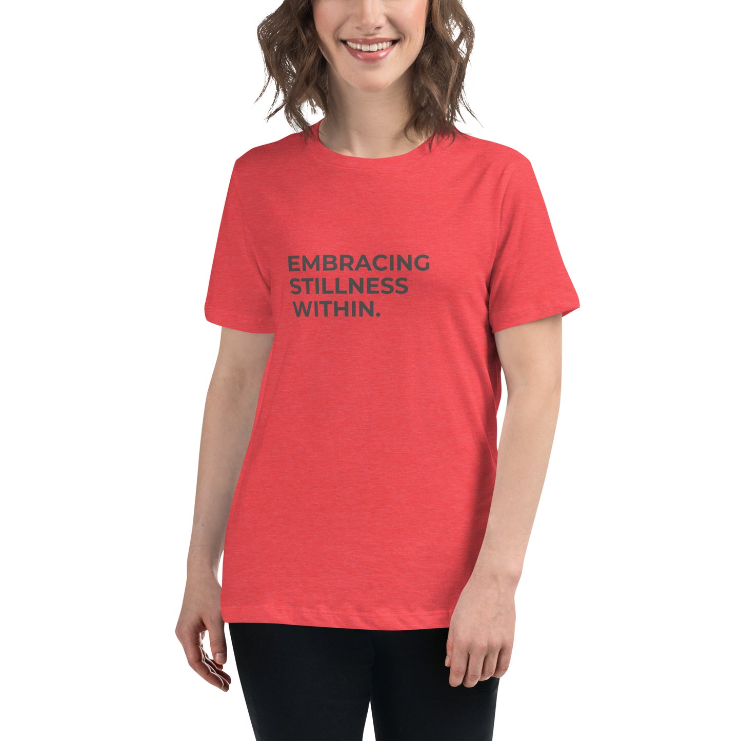 Woman wearing a heather red relaxed tee with "Embracing Stillness Within" printed.