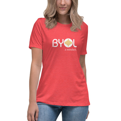 Woman wearing a heather red relaxed fit BYOL mindset t-shirt  with color options in black, pink, blue, and gray, available in sizes S to 3XL.