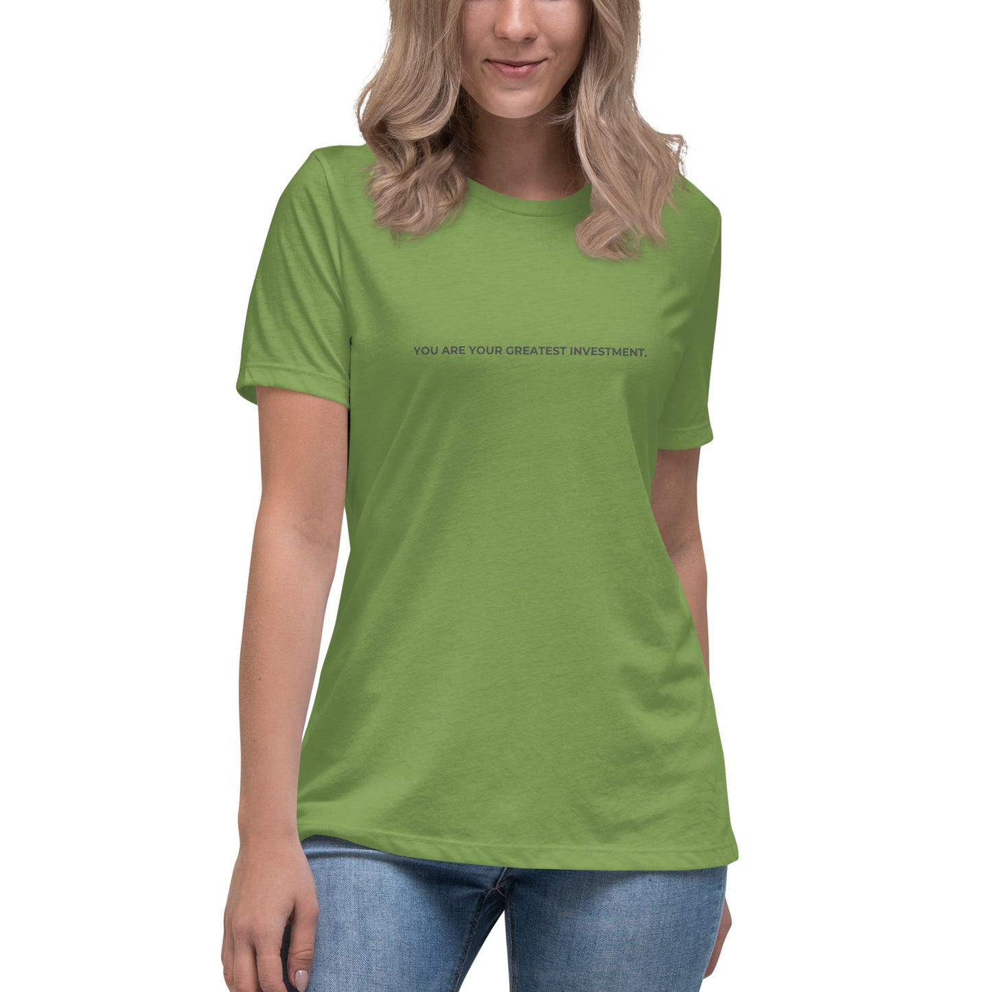 Woman wearing a leaf relaxed tee with "You Are Your Greatest Investment" printed.