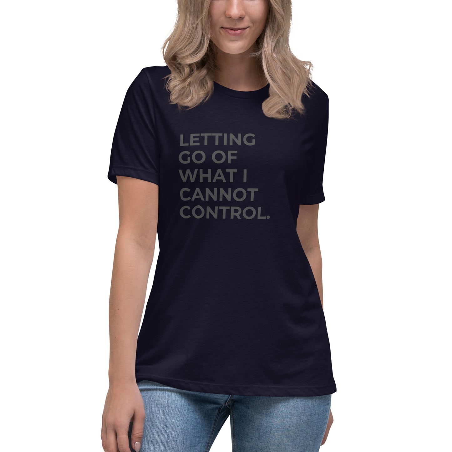 Woman wearing a navy relaxed tee with "Letting Go of What I Cannot Control" printed.