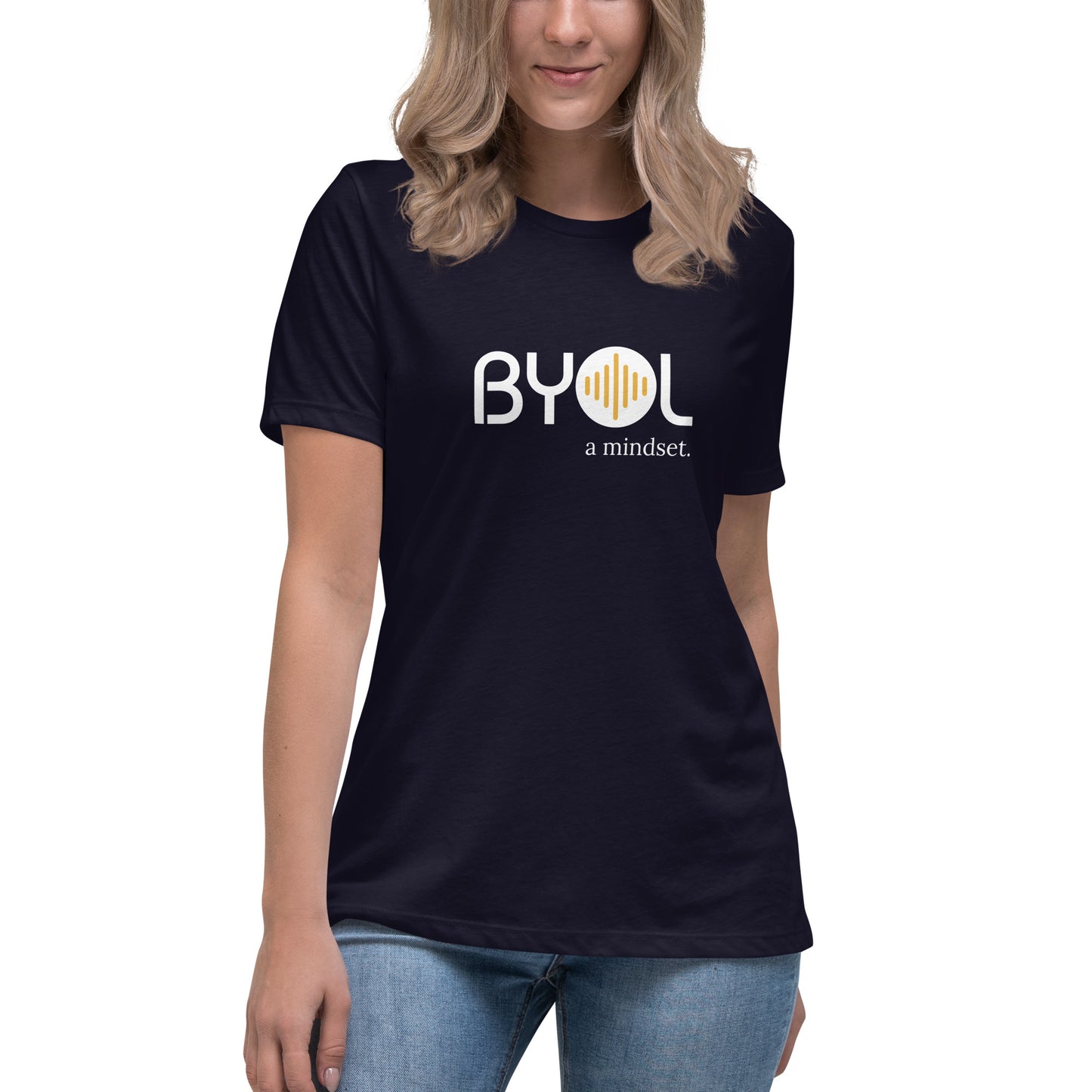 Woman wearing a navy blue relaxed fit BYOL mindset t-shirt  with color options in black, pink, blue, and gray, available in sizes S to 3XL.