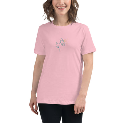 Woman wearing a pink relaxed tee with a minimalist flower graphic design, embodying comfortable and authentic fashion by BYOL.