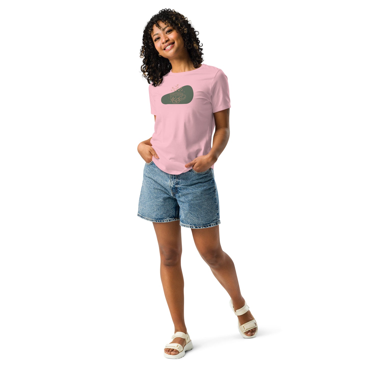 Woman wearing a pink relaxed tee with a subtle floral coffee cup graphic design, representing comfortable and authentic fashion by BYOL.