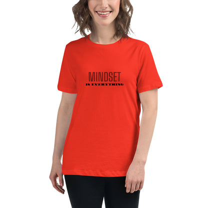 Woman wearing a poppy red relaxed t-shirt with the phrase "Mindset is Everything" printed in black.