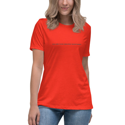 Woman wearing a poppy relaxed tee with "You Are Your Greatest Investment" printed.