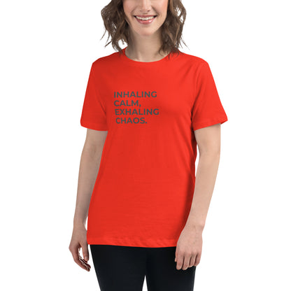 Woman wearing a poppy relaxed tee with "Inhaling Calm, Exhaling Chaos" printed.