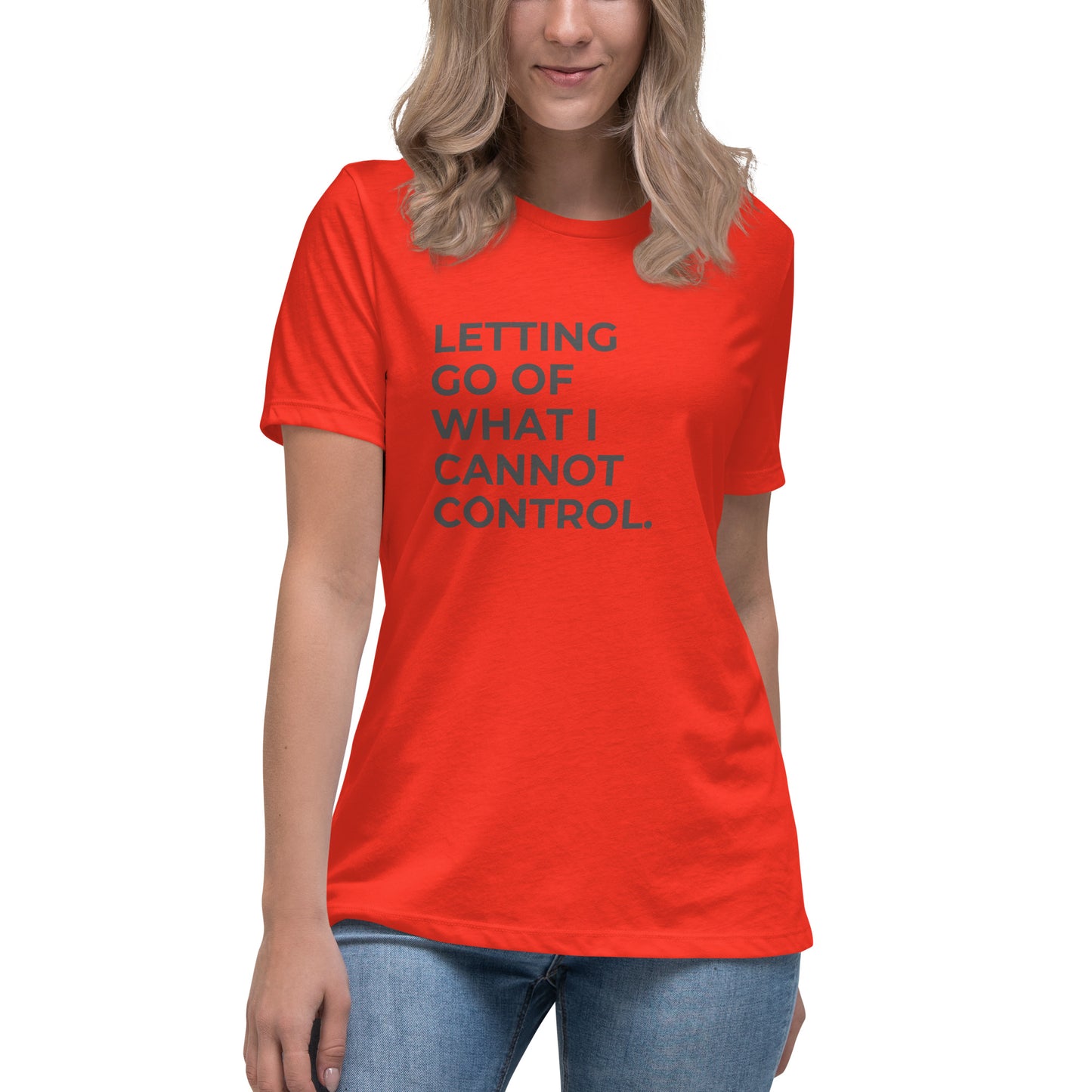 Woman wearing a poppy relaxed tee with "Letting Go of What I Cannot Control" printed.