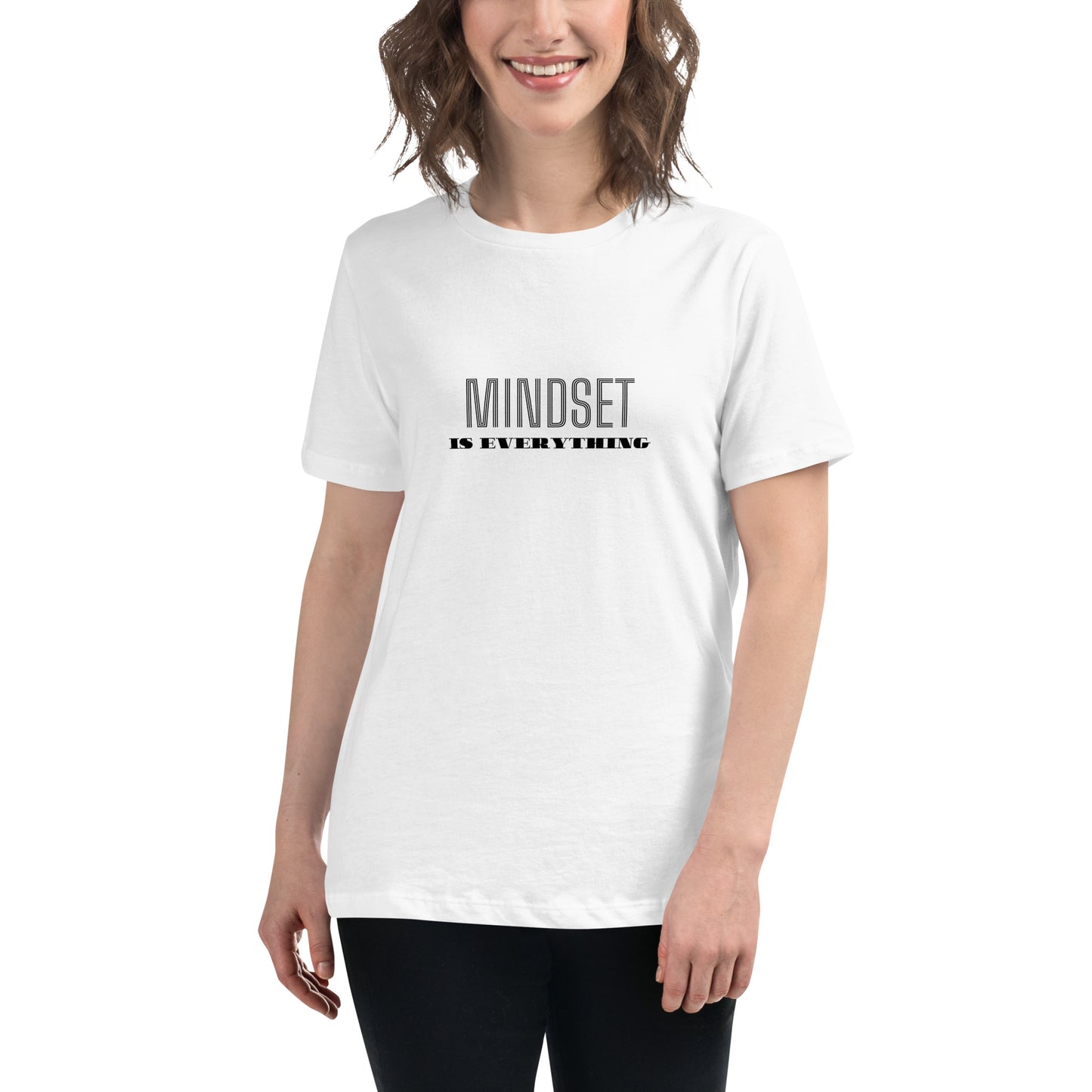 Woman wearing a white relaxed t-shirt with the phrase "Mindset is Everything" printed in black.